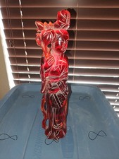 Chinese Carved Cherry Amber (Faux Amber / Bakelite) Figure of an Immortal on Wood Stand