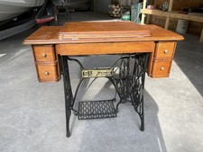 Singer Model 66 Treadle Sewing Machine with Red Eye Decals in Oak Cabinet — listing 6