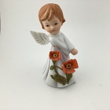 White Bisque Porcelain Angel Figurine Holding Infant with Glitter Snow Accents — listing 6