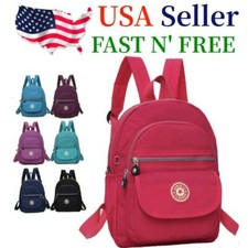Black Nylon and Faux Leather Flap-Top Mini Backpack with Zip Front Pocket Yes - logo stamped on hardware/zippers — listing 3