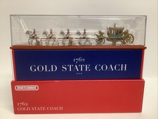 Die-Cast Model Gold State Coach with Eight-Horse Team and Postilion Riders, listing 3