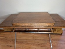 Antique Treadle Sewing Machine in Ornate Cast-Iron and Oak Cabinet — listing 4