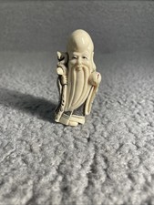 Carved Netsuke-Style Figure of Crouching Man Holding a Lantern Heavy, cool, dense — likely bone or ivor — listing 6
