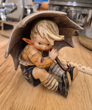Vintage Ceramic Figurine of Boy with Umbrella and Bundle — listing 5
