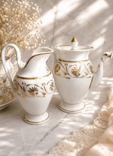 Antique Ivory Porcelain Coffee Pot with Gilt Scalloped Rim and Molded Floral Relief