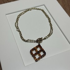 Gold-Tone Necklace with Round Tortoiseshell-Pattern Resin Pendant — listing 4