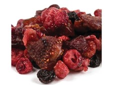 Dried Berry or Fruit Remnant on Wooden Surface