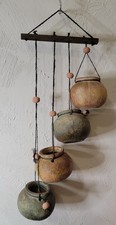 Cluster of Miniature Terracotta Pots Wrapped in Palm Leaf on Jute Rope Hanger — listing 5