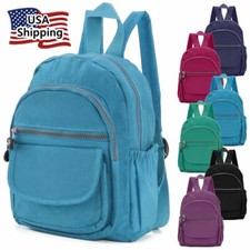 Black Nylon and Faux Leather Flap-Top Mini Backpack with Zip Front Pocket Yes - logo stamped on hardware/zippers — listing 2