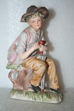 Bisque Porcelain Figurine of Child Under Umbrella with Ducks — listing 5