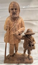 Pair of Hand-Carved Folk Art Wooden Figures — Peasant Woman and Man on Log Bases Only the carved initials shown — listing 3
