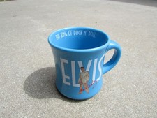 Vintage Elvis Presley Black Ceramic Pedestal Mug/Stein with Gold Jumpsuit Graphic — listing 5