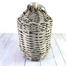 Vintage Whiskey Jug with Rope-Woven Basket Cover and Twin Handles