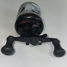 Vintage Copper-Finish Level-Wind Baitcasting Reel with White Handle Knobs