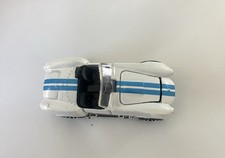 Vintage Die-Cast Sports Car Toy in Metallic Purple/Magenta