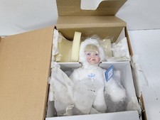 The Ashton-Drake Galleries Porcelain Snow Baby Dolls, Set of 4